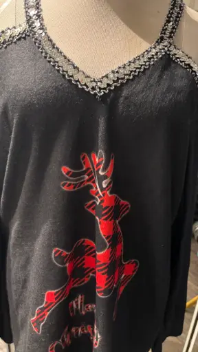 Pull de Noël épaules dénudées 