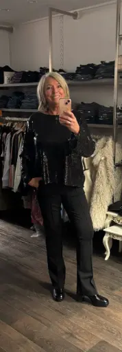 Blouse paillettes noir nœud dans le dos. TU.38/44